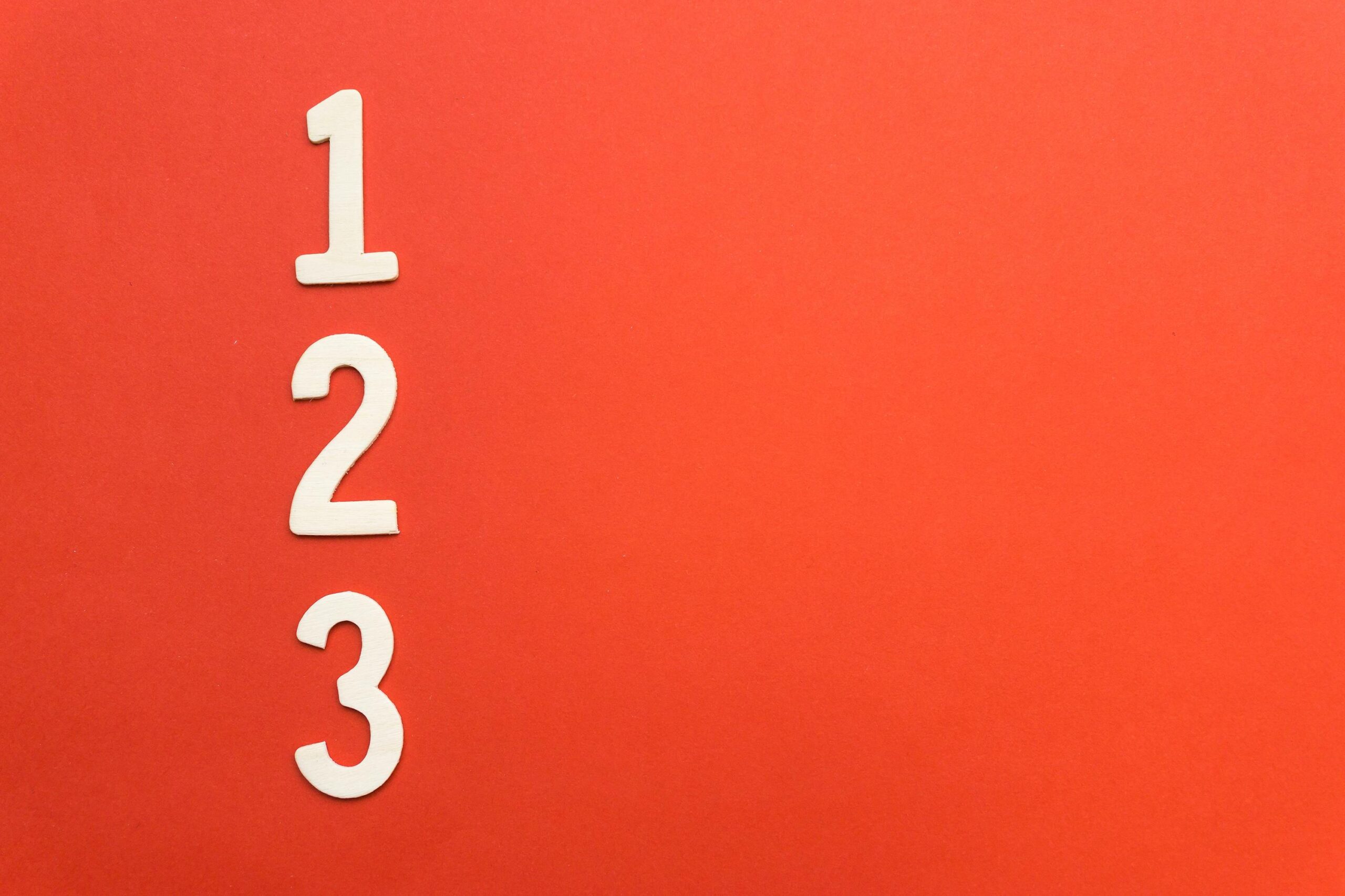 Red background with “123” text overlay symbolising financial planning and numerical analysis